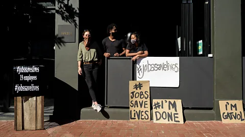 Alamy Restaurant workers in Cape Town protesting alcohol restrictions during the pandemic (Credit: Alamy)