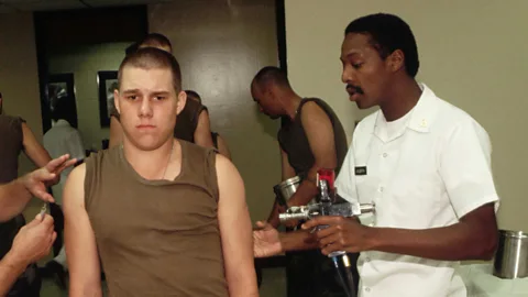 Getty Images Outbreak fears began at Fort Dix army base. A soldier there is given a standard vaccination a few years later (Credit: Getty Images)