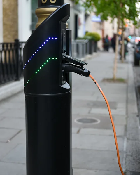 Getty Images Rolling out infrastructure for charging electric vehicles is one of the systemic changes that could be seen as London approaches net zero (Credit: Getty Images)