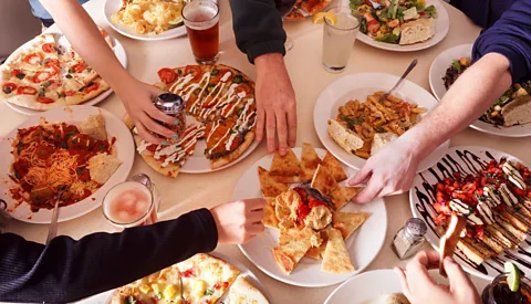 Alamy It may be a while until we can return to work social events and happy hours that keep our office friendships thriving (Credit: Alamy)