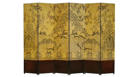 MAD Paris/ Christophe Dellière An exquisite, Chinese-influenced screen entitled Race in the Forest was created by Armand-Albert Rateau in 1925 (Credit: MAD Paris/ Christophe Dellière)