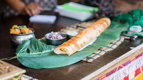 Nigel Killeen/Getty Images The globally ubiquitous masala dosa is filled with spicy potatoes (Credit: Nigel Killeen/Getty Images)