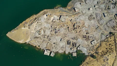Burak Kara/Getty Images The banks of a river became the edge of a lake, and then it rose to take the ancient settlement (Credit: Burak Kara/Getty Images)