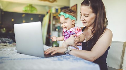 A mum on a video call with her baby girl.