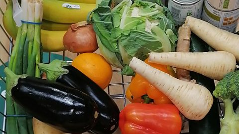 Loose veg in a supermarket trolley.