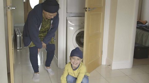 A grandma and her grandson singing an action song.