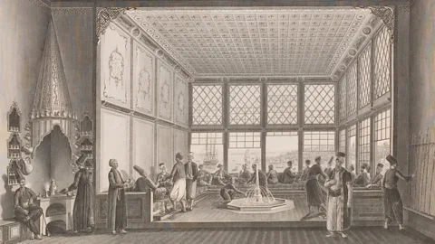 Historic Collection/Alamy Coffeehouses were a staple in the Ottoman Empire, where they developed as spaces for men to meet, relax and trade (Credit: Historic Collection/Alamy)