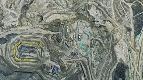Martin Bernetti/Getty Images Away from the tailings, vehicle tracks weave around the Chilean copper mine (Credit: Martin Bernetti/Getty Images)