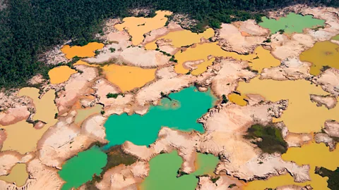 Cris Bouroncle/Getty Images Elsewhere in the Amazon, in Peru, a deforested area caused by illegal gold mining in the river basin of the Madre de Dios (Credit: Cris Bouroncle/Getty Images)