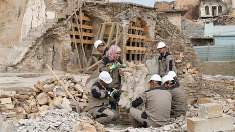 Unesco-Moamin Al-Obaidi Artworks and artefacts are being salvaged from the rubble and will eventually decorate the place of worship once again (Credit: Unesco-Moamin Al-Obaidi)