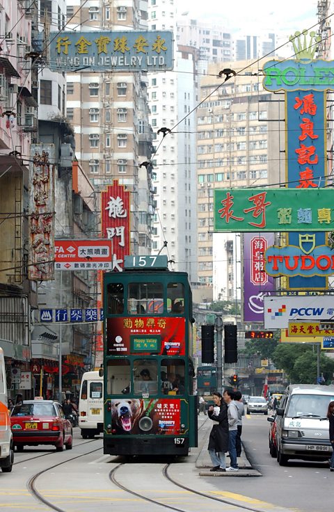 Hong Kong Street Scene featuring a trolly/tram