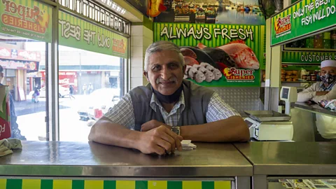 Heather Richardson Rashaad Pandy, who is widely credited with creating the Gatsby, still works at his fish and chip shop today (Credit: Heather Richardson)