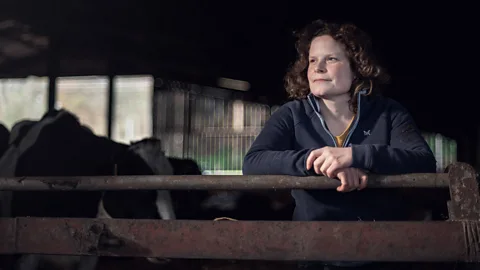 John Quintero/BBC Dairy farming is Hannah Edwards' profession and vocation – and the welfare of the herd is always her primary concern (Credit: John Quintero/BBC)