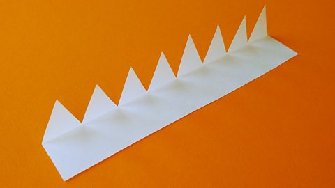 A tabbed zigzag strip