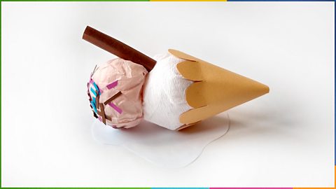 A 3D paper ice cream with scallop detail in the cone