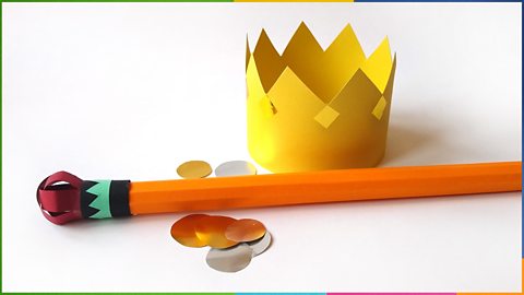 A 3D crown and staff with zigzag details