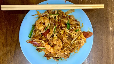 Kirsten Raccuia Uncle Tan has been cooking this dish for almost 60 years and was taught by his father (Credit: Kirsten Raccuia)