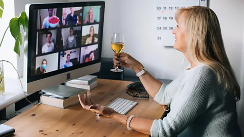 Alamy It's challenging to replicate the feeling of in-person camaraderie in a virtual environment – which may be why Zoom happy hours feel pointless (Credit: Alamy)