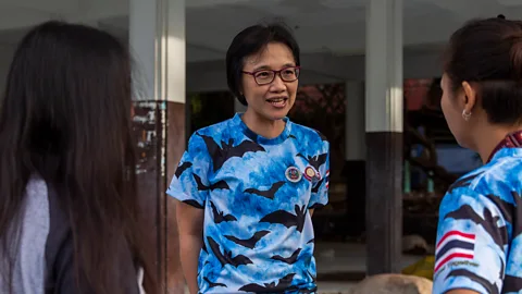 Getty Images Supaporn Wacharapluesadee speaks with her team, which was the first to confirm a Covid-19 case outside China, on a bat collecting mission in September 2020 (Credit: Getty Images)