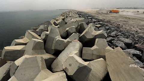 Getty Images The "Great Wall of Lagos" is intended to reinforce the coast and protect it from erosion (Credit: Getty Images)