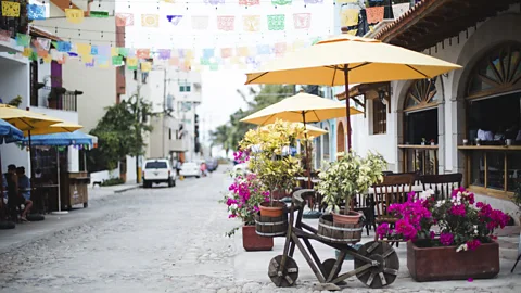 Linda Raymond/Getty Images Fondas (small restaurants) line streets across Mexico (Credit: Linda Raymond/Getty Images)
