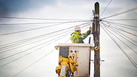Alamy Many employers now require four-year degrees for jobs that didn't previously need them, in part because of the increased role of technology across all industries (Credit: Alamy)