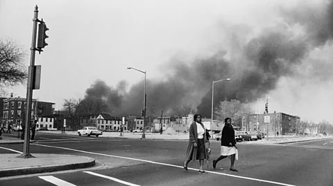 Getty Images Smoke rises above Washington DC following the assassination of Martin Luther King in 1968 (Credit: Getty Images)