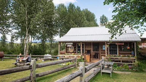 Cavan Images/Alamy Located next door to the Merc, Adair's original homestead cabin is now the Northern Lights Saloon (Credit: Cavan Images/Alamy)