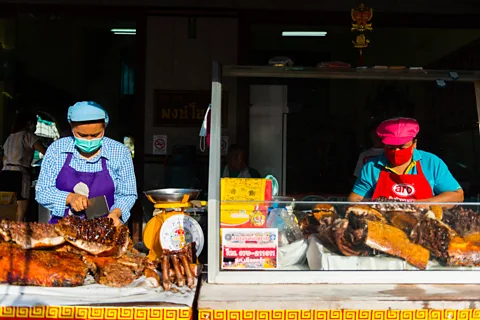 Austin Bush Across Trang, local-style roast pork is sold by the kilogram – often for breakfast (Credit: Austin Bush)