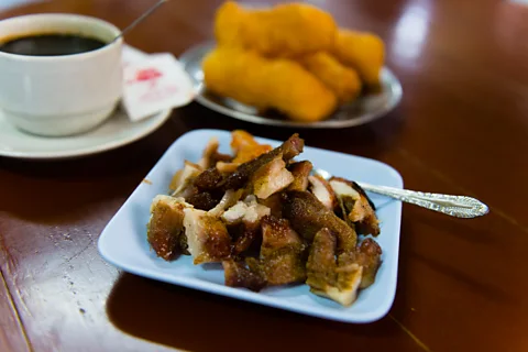 Austin Bush In Trang, many dishes that are consumed before the sun comes up are typically considered lunch fare elsewhere in Thailand (Credit: Austin Bush)