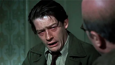 Alamy John Hurt gives a formidable performance as Timothy Evans, who was wrongly hanged for his wife’s murder (Credit: Alamy)