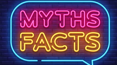 A neon sign which reads "myths facts". 