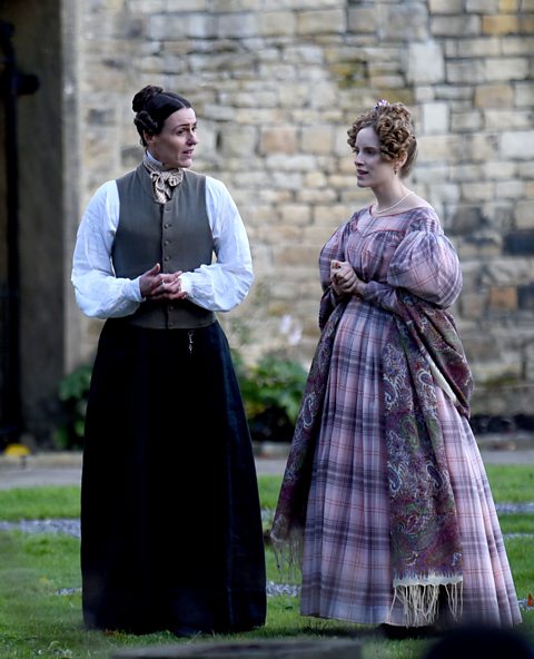 Suranne Jones and Sophie Rundle on set of Gentleman Jack in period dress,  Anne Lister and Ann Walker.