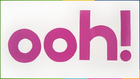 The word "Ooh!" cut from paper