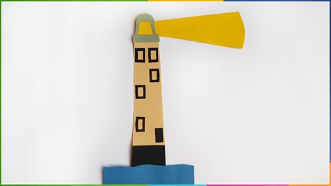 A 2D paper lighthouse with square holes for windows