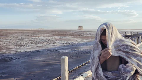 Solmaz Daryani The shifting edge of the lake can be appreciated using benchmarks like piers and old boats that remain where they were once used (Credit: Solmaz Daryani)