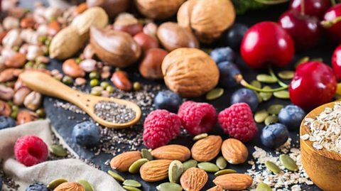 Sugary foods won’t cheer you up Nuts and fruit for snacking