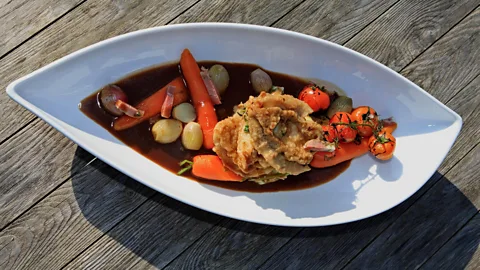 Ally Clark/Alamy Ormers can be prepared in a variety of ways, from flash frying in butter to slow cooking in a stew (Credit: Ally Clark/Alamy)