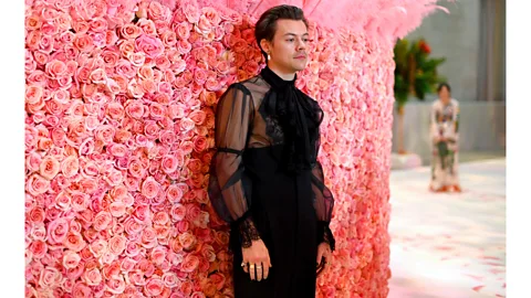 Getty Images At the Met Gala in 2019, Styles wore a sheer black blouse and a pearl earring – the theme was "Camp" (Credit: Getty Images)