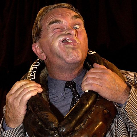 A contestant competes for the Mens Gurning Title at the Crab Apple Fair in Egremont, Cumbria.