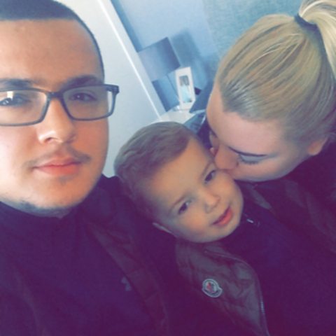 Lewis with his partner Chloe and son Lewis.