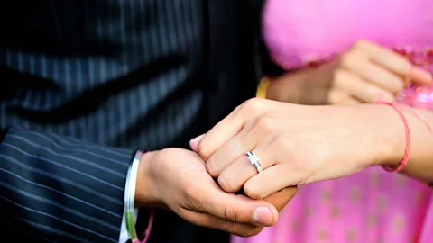 Alamy The conditions in which younger generations achieve have changed dramatically – but the pressure to hit major life milestones like getting married hasn't moved (Credit: Alamy)