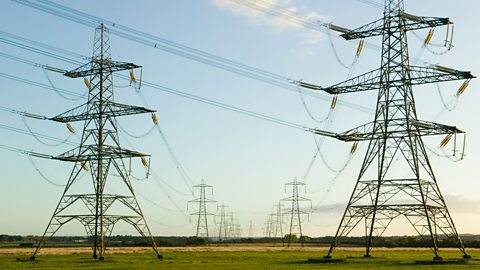 Electricity pylons support overhead cables that transport electricity.