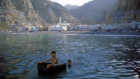 Helmut Corneli/Alamy Located on a strategic point on the Strait of Hormuz, the tiny village of Kumzar is only accessible by boat (Credit: Helmut Corneli/Alamy)