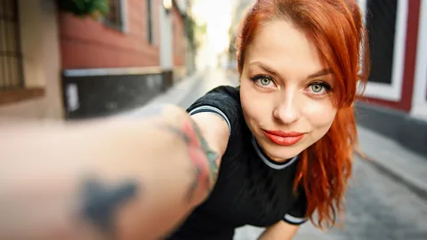 Alamy Constantly plastering selfies across social media may not mean the person is obsessed with themselves. In fact, it might mean they feel insecure about themselves. (Credit: Alamy)