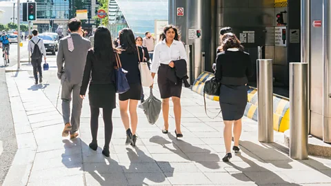 Alamy Young workers in industries including consulting and finance are used to spending lots of time in the office to prove themselves to higher ups (Credit: Alamy)