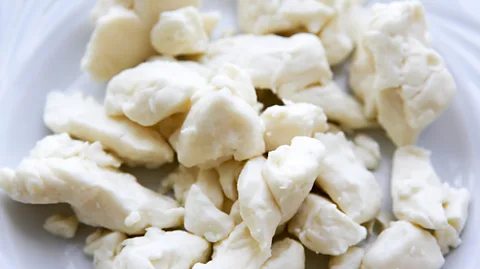 Bouillante/Getty Images Fresh salty cheese curds give poutine its signature squeaky texture (Credit: Bouillante/Getty Images)