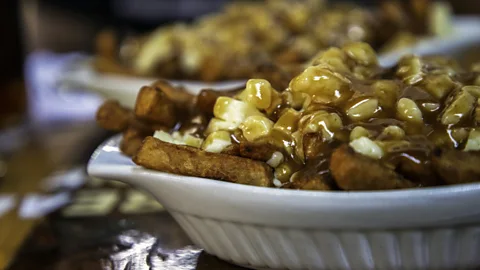 JML Images/Getty Images The beloved comfort food poutine is a combination of French fries, cheese curds and a rich meaty gravy (Credit: JML Images/Getty Images)