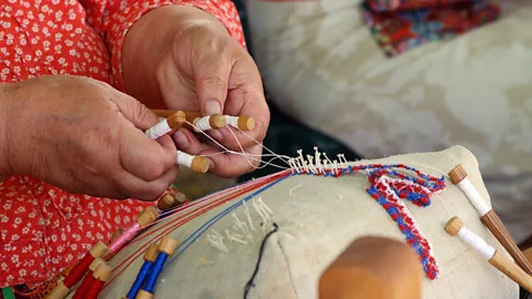 Margit Kurvits/FOCUS/Universal Images Group via Getty Images Kihnu women are keepers of cultural traditions including weaving (Credit: Margit Kurvits/FOCUS/Universal Images Group via Getty Images)