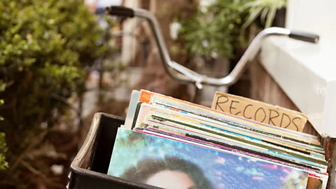 Alamy Reminiscing about shared experiences, like your favourite music from childhood, can bond colleagues and improve office social dynamics (Credit: Alamy)